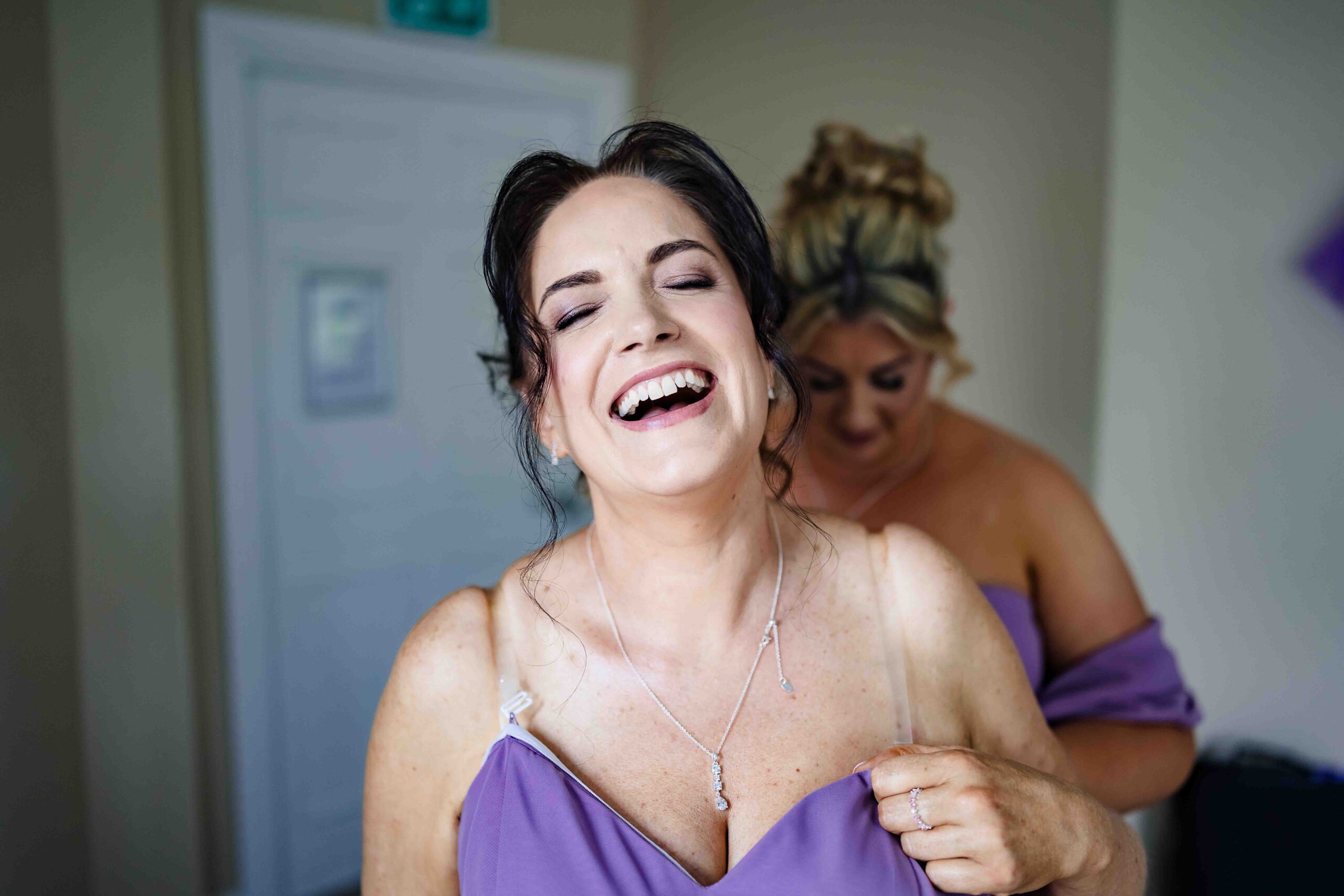 Bridal makeup finishing touches on wedding morning