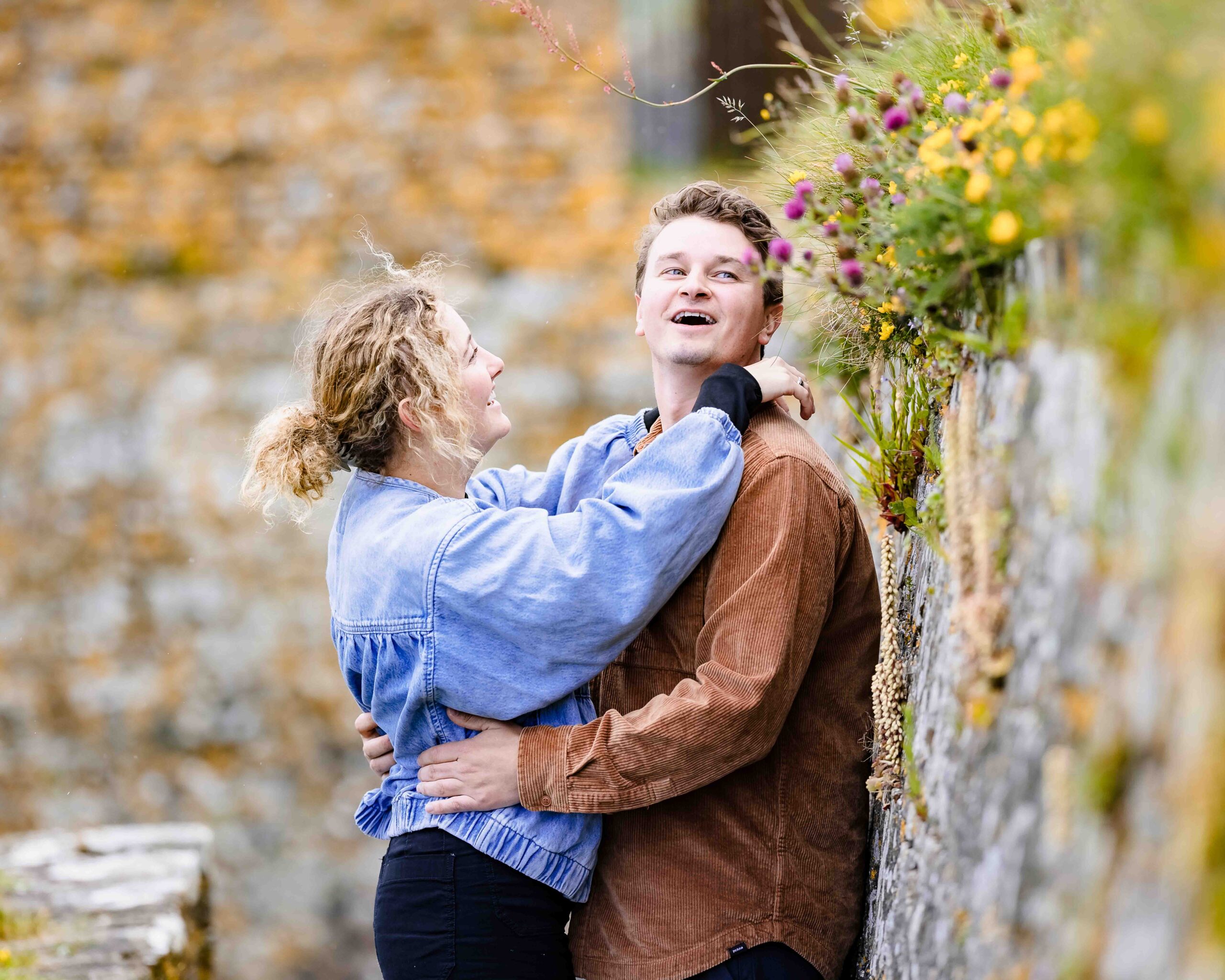 Couple embracing after surprise proposal in Kinsale