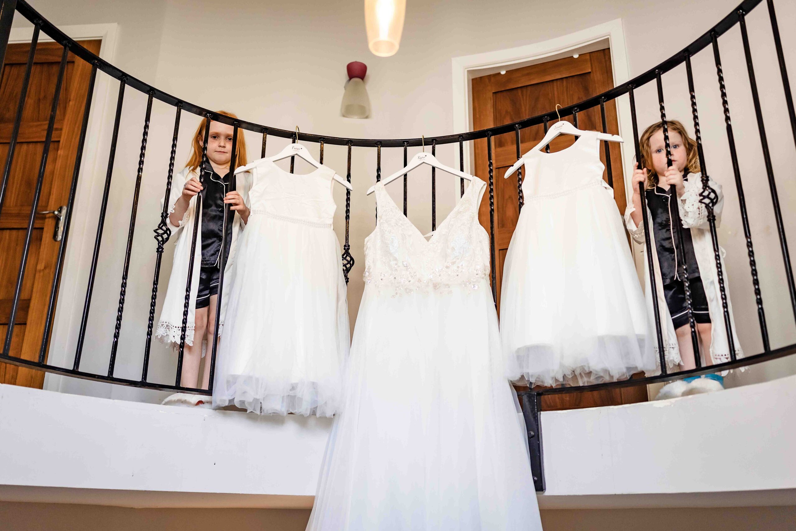 Kyra laughing with her bridesmaids during wedding preparations