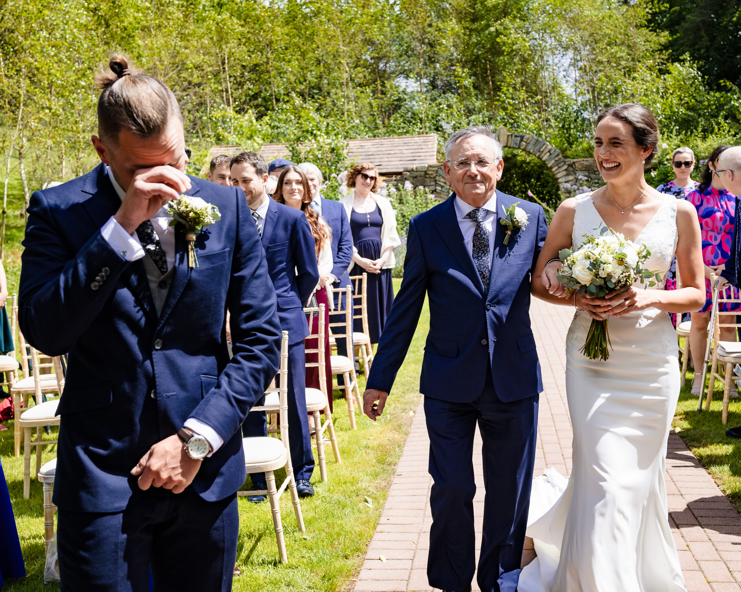 Bride and groom enjoying the colourful gardens at Fernhill House Hotel