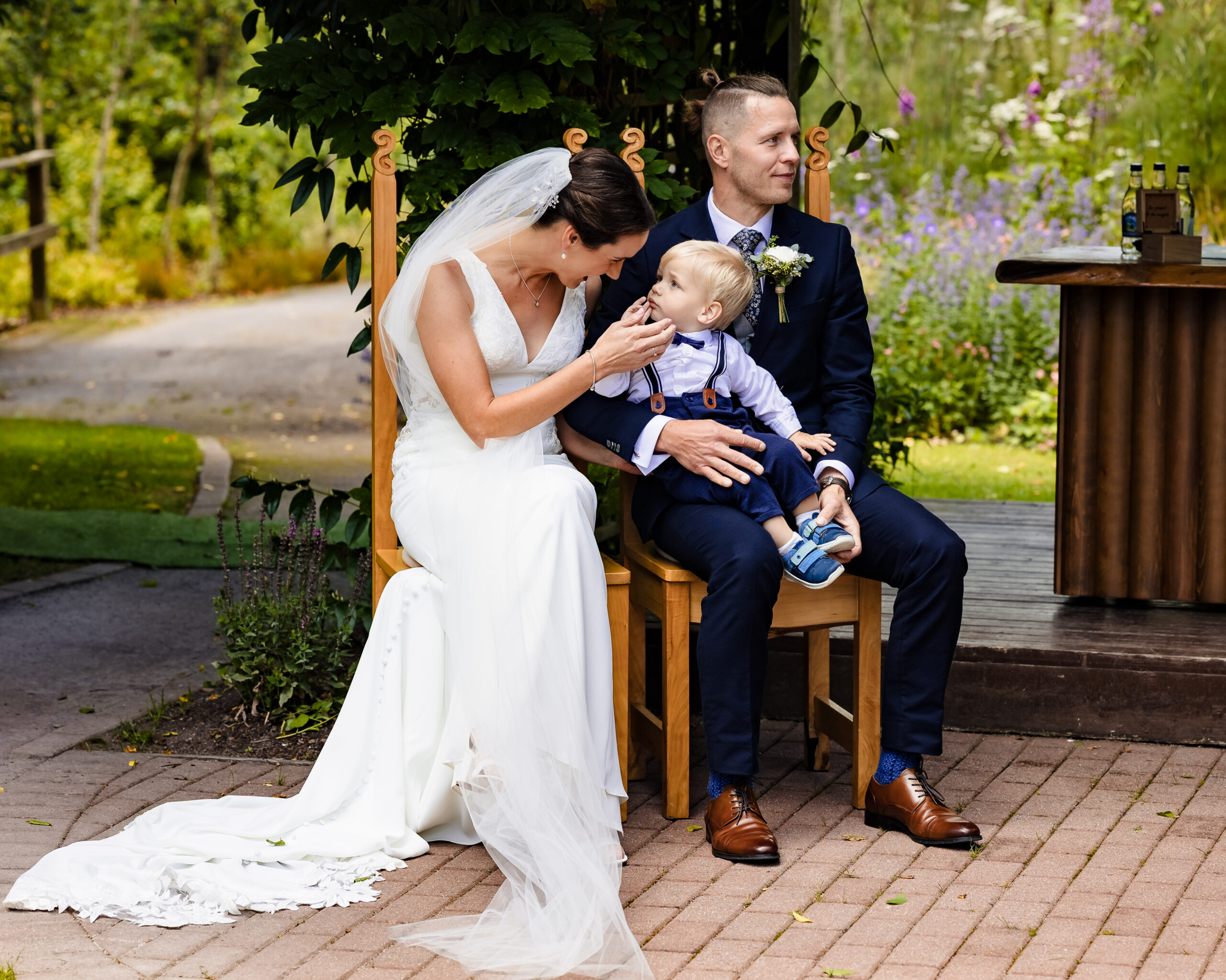 Bride and groom laughing together during portraits at Fernhill House