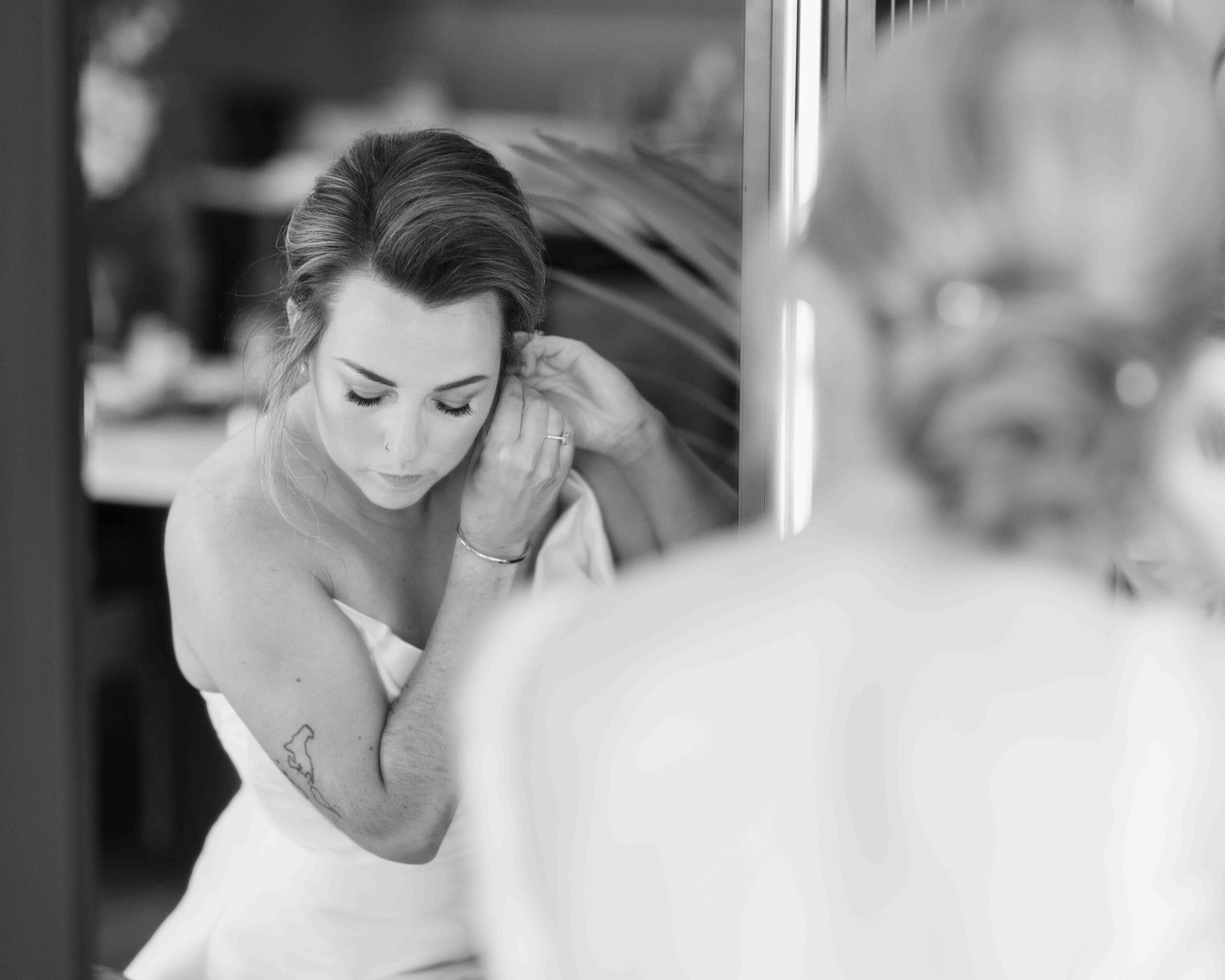 Bride smiling during bridal preparations in the Styling Lounge at Fernhill House – JOD Photography