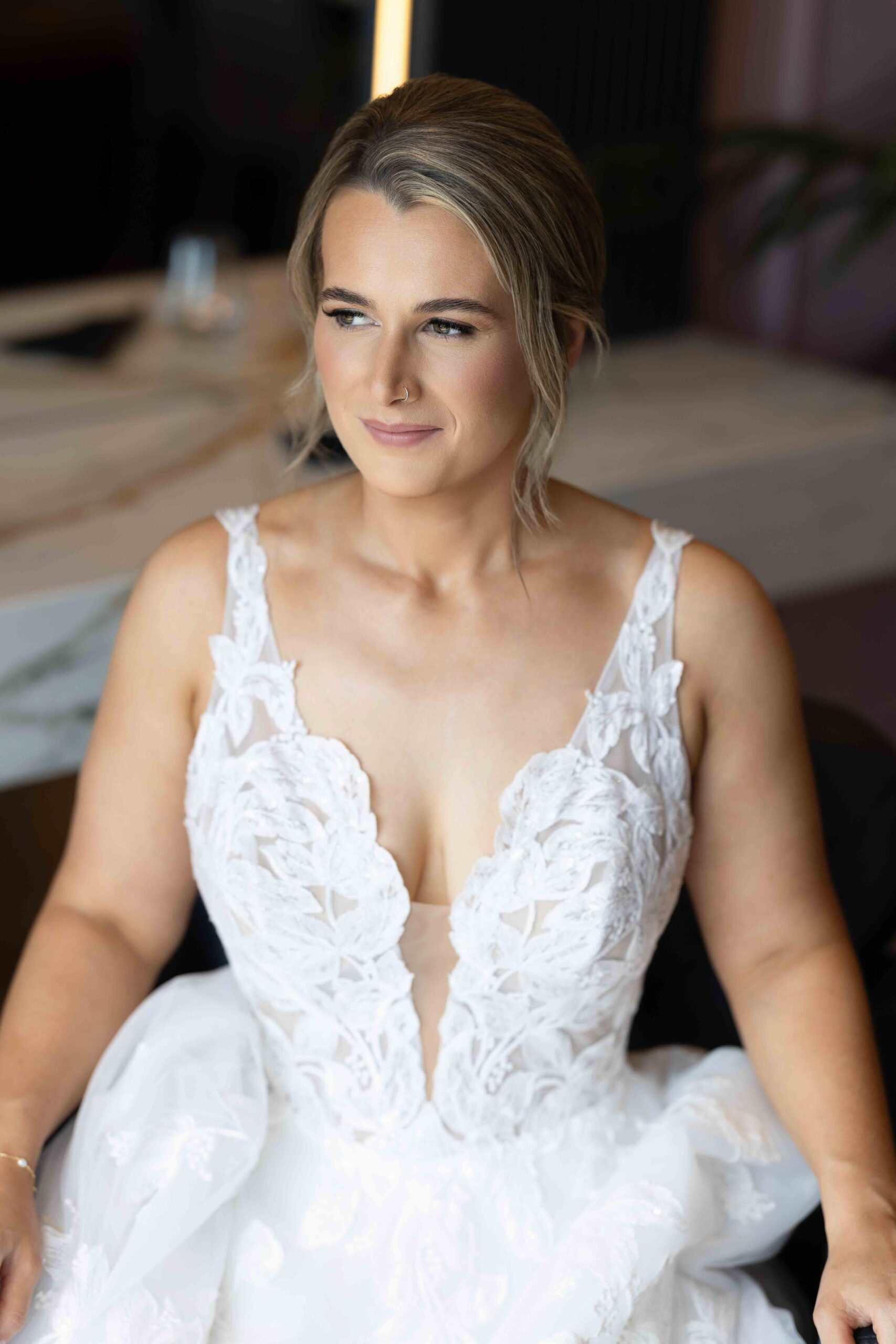 Bride smiling during bridal preparations in the Styling Lounge at Fernhill House – JOD Photography