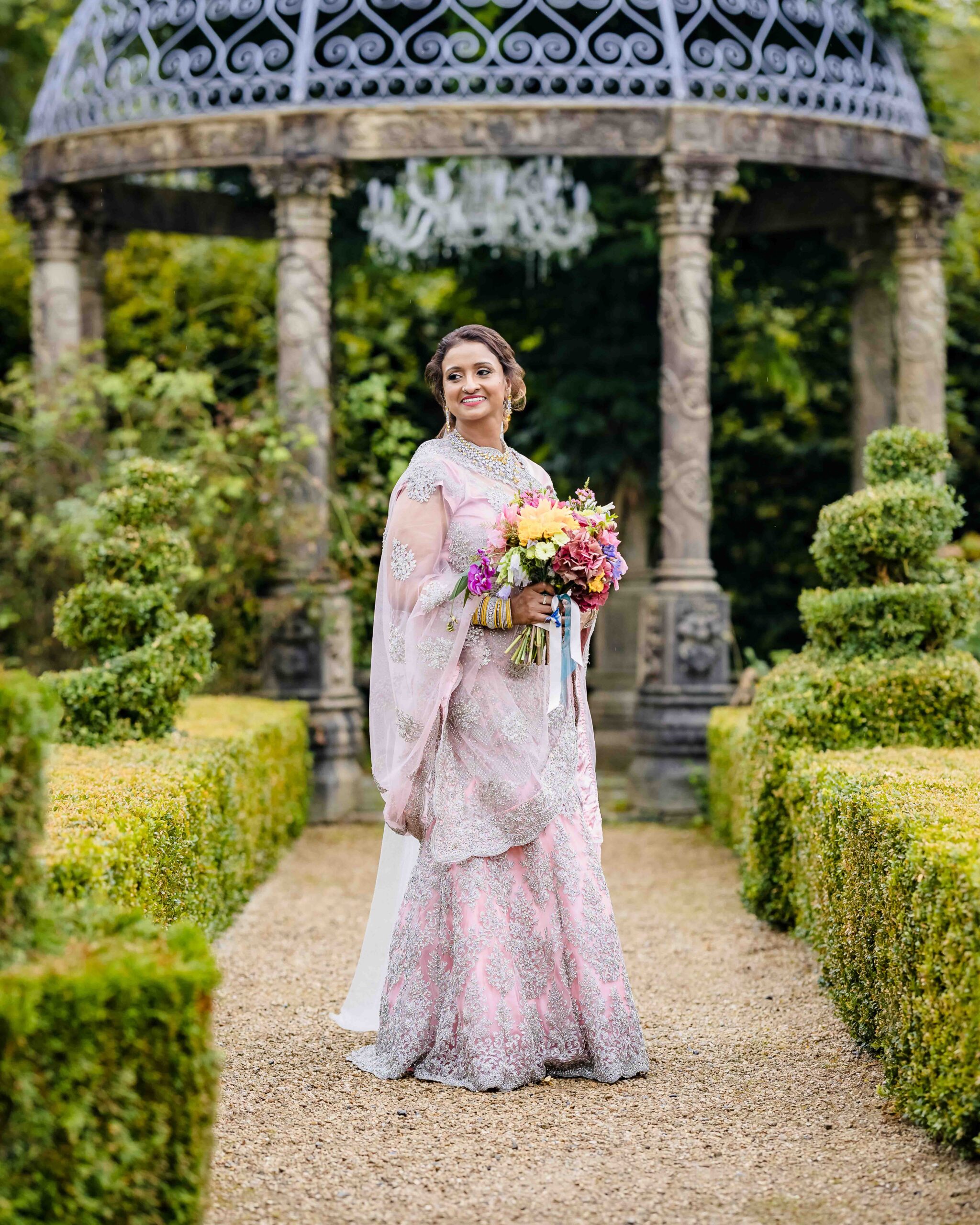 Monita's family bringing incredible colour to her wedding ceremony at Ballyseede Castle in Kerry.