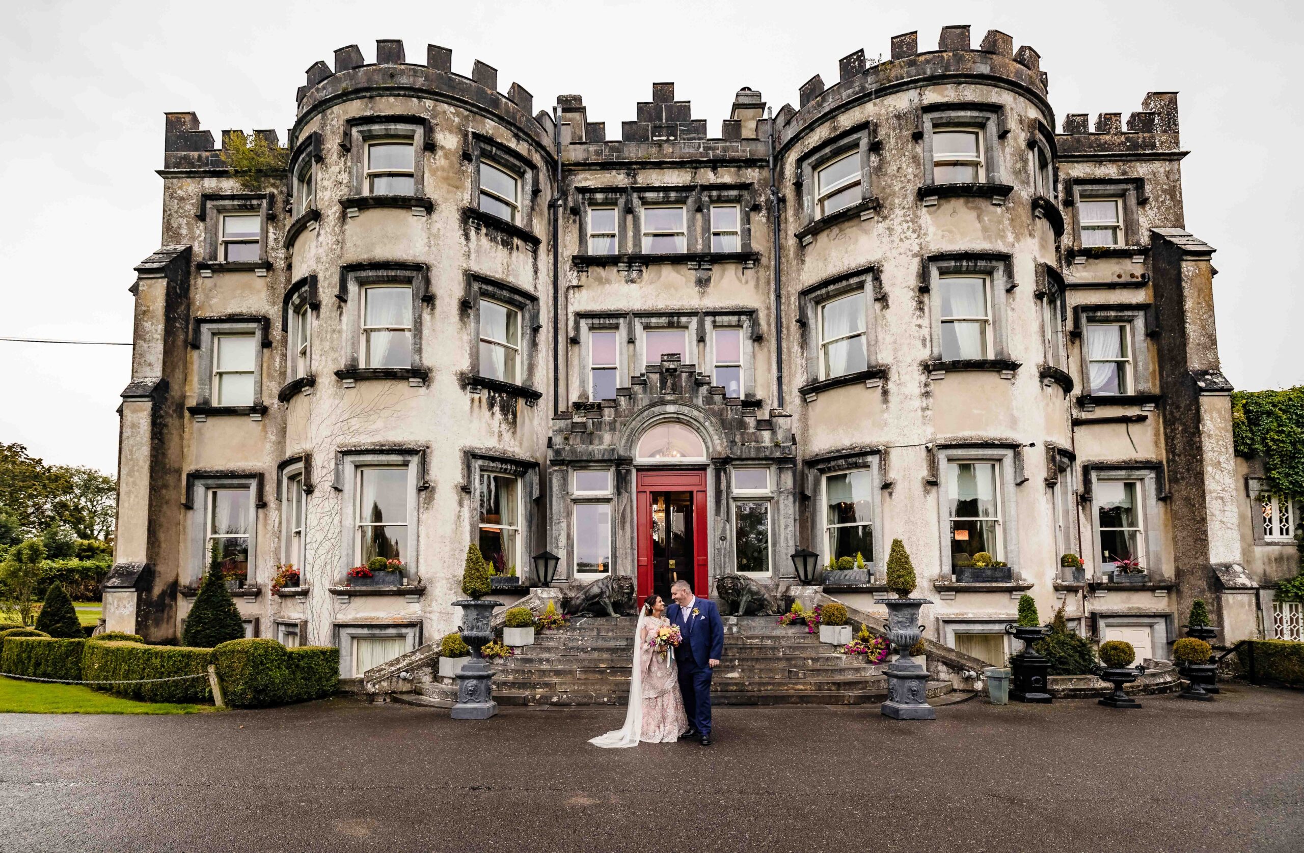 Close-up wedding photograph of Monita and Damien's rings surrounded by sparkling jewellery at Ballyseede Castle.