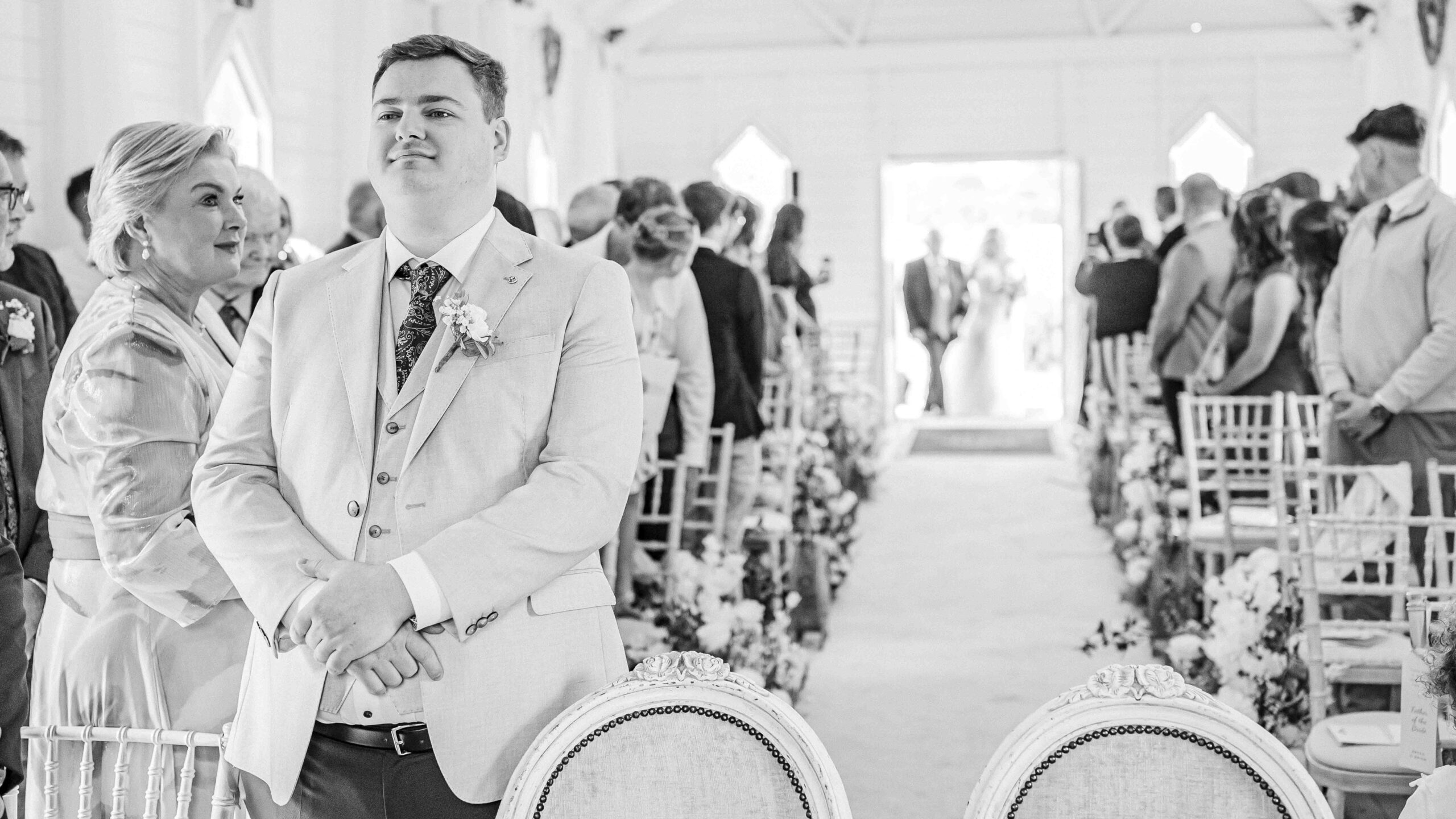 Newlyweds leaving the chapel at Clanard Court Hotel