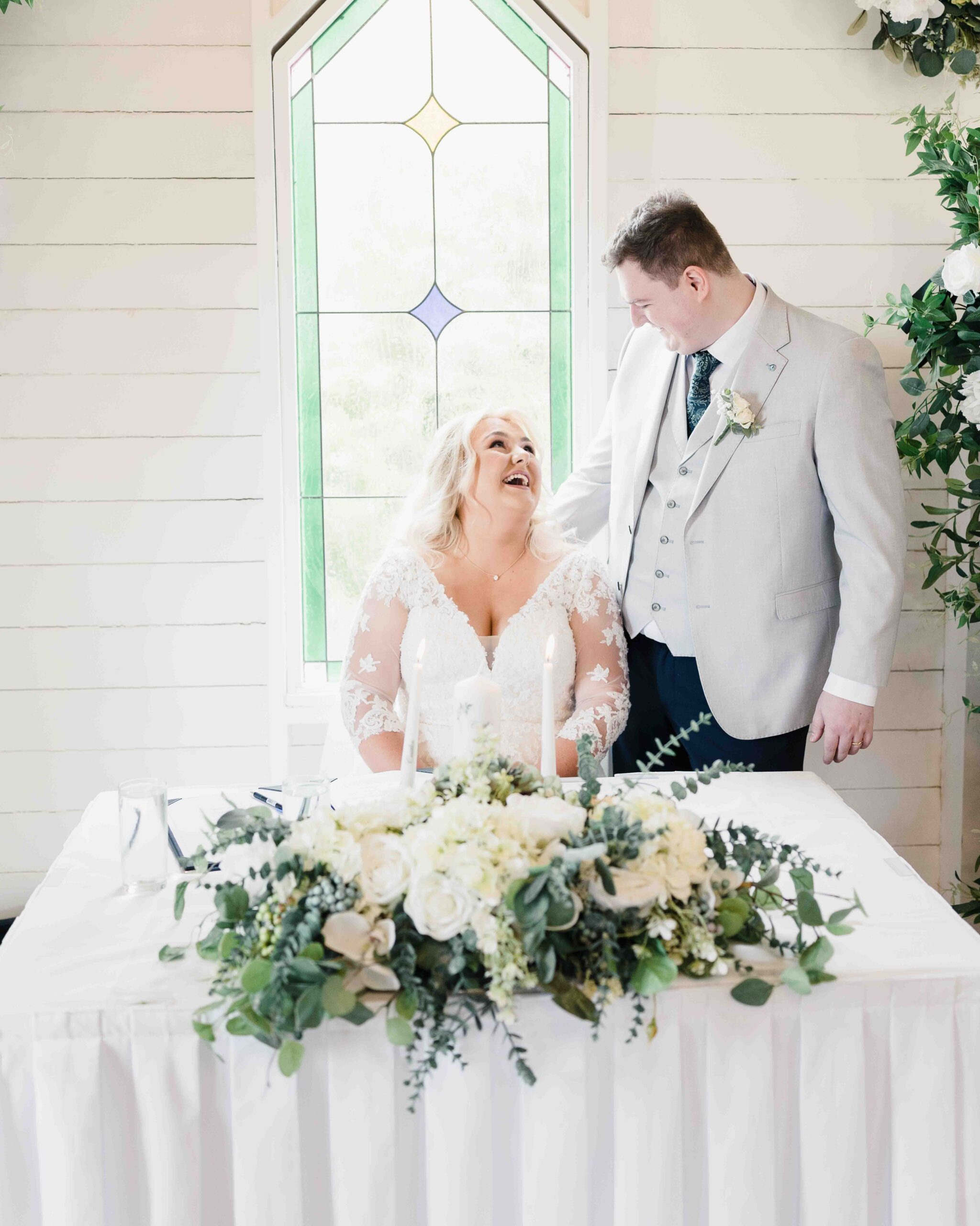 Caitlin and Jason walking together outside the Clanard Court chapel