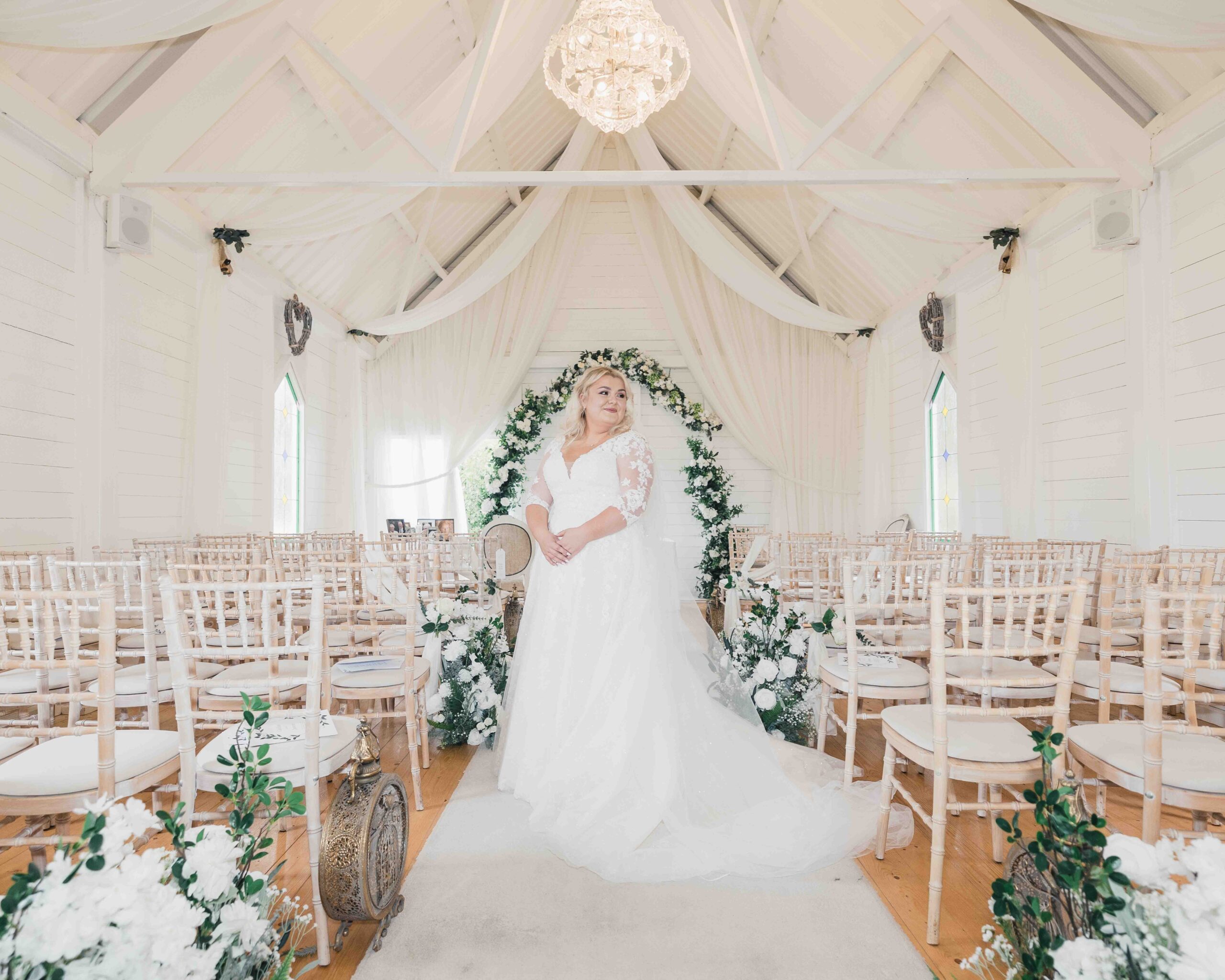Caitlin laughing with Jason during their intimate chapel ceremony