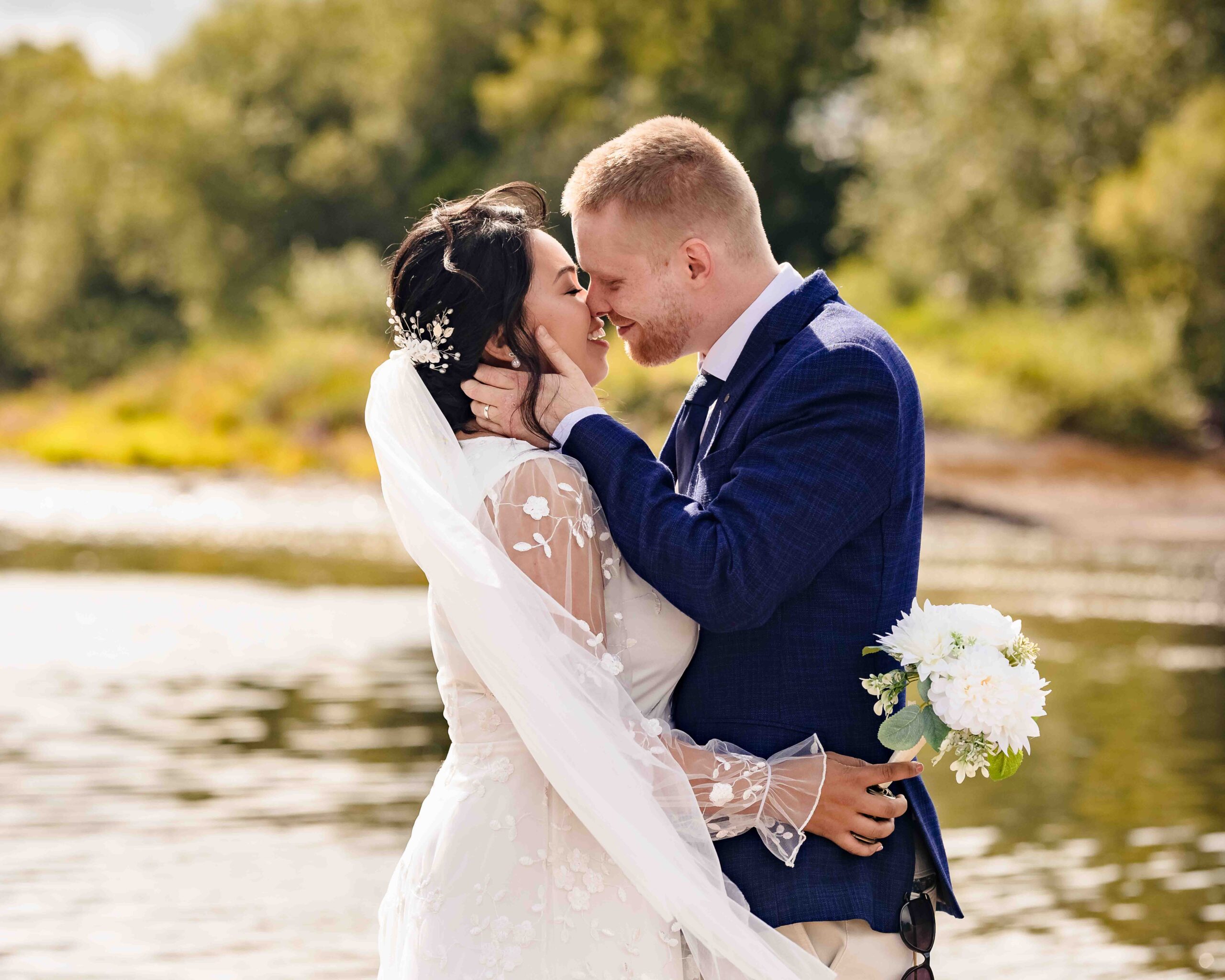 Audrey and Ben having fun during their wedding photographs in Ballincollig