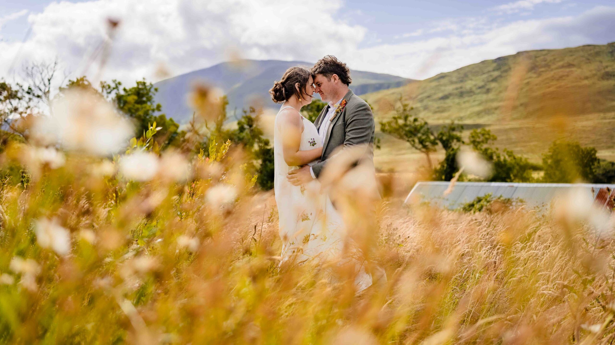 Aíne and Ciarán laughing together on their wedding day | JOD Photography