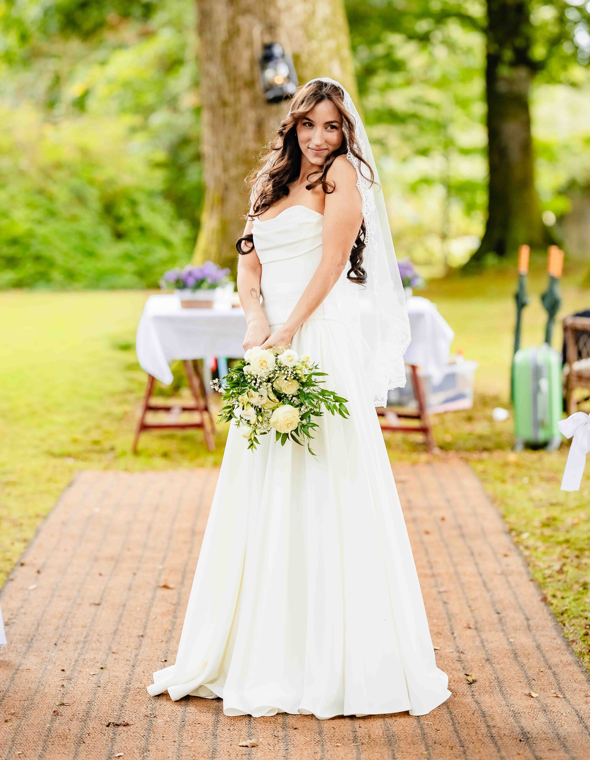 Newlyweds laughing as they leave their woodland wedding ceremony in Cork – JOD Photography