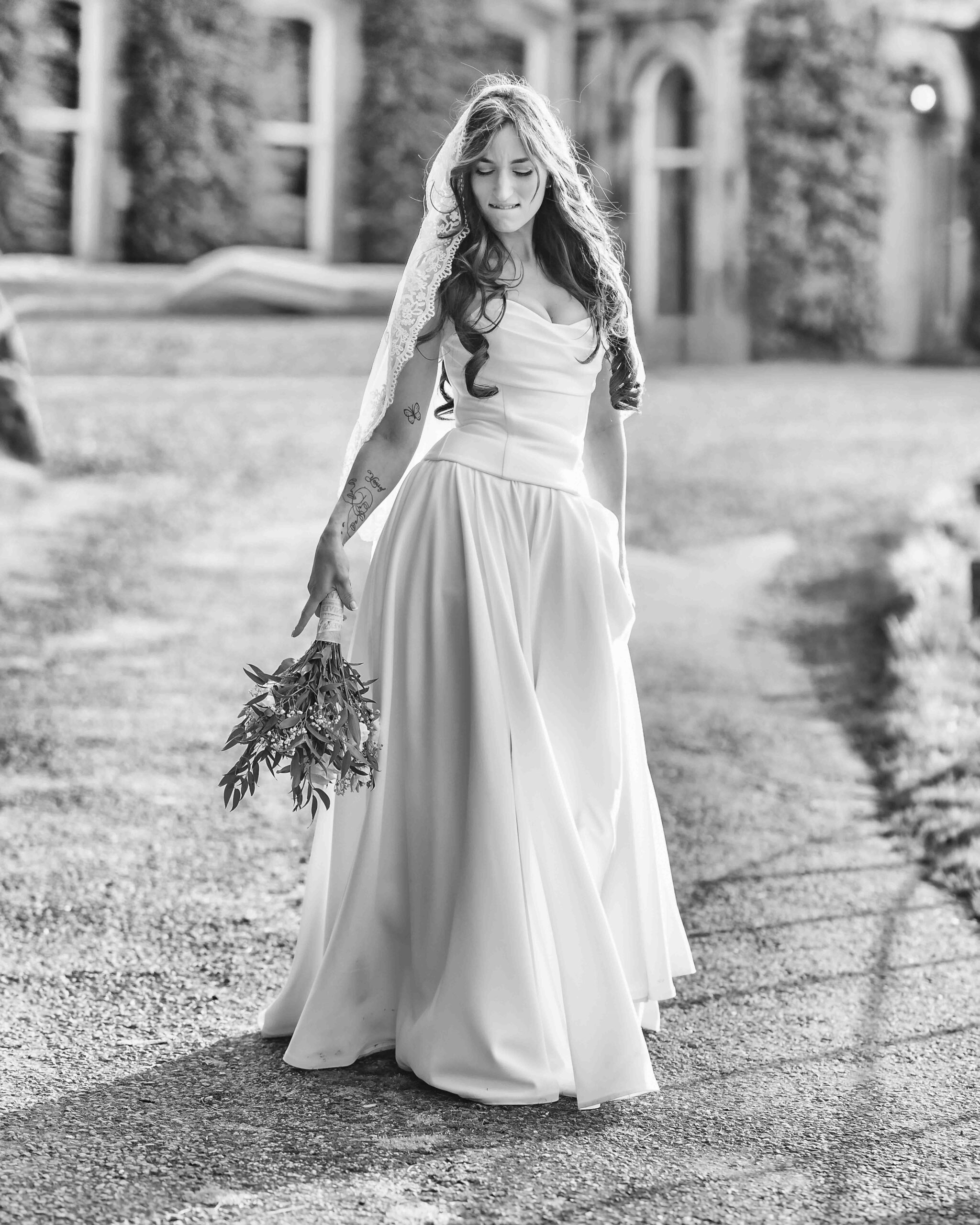 Andzelika and Evan holding hands during their outdoor wedding ceremony – JOD Photography