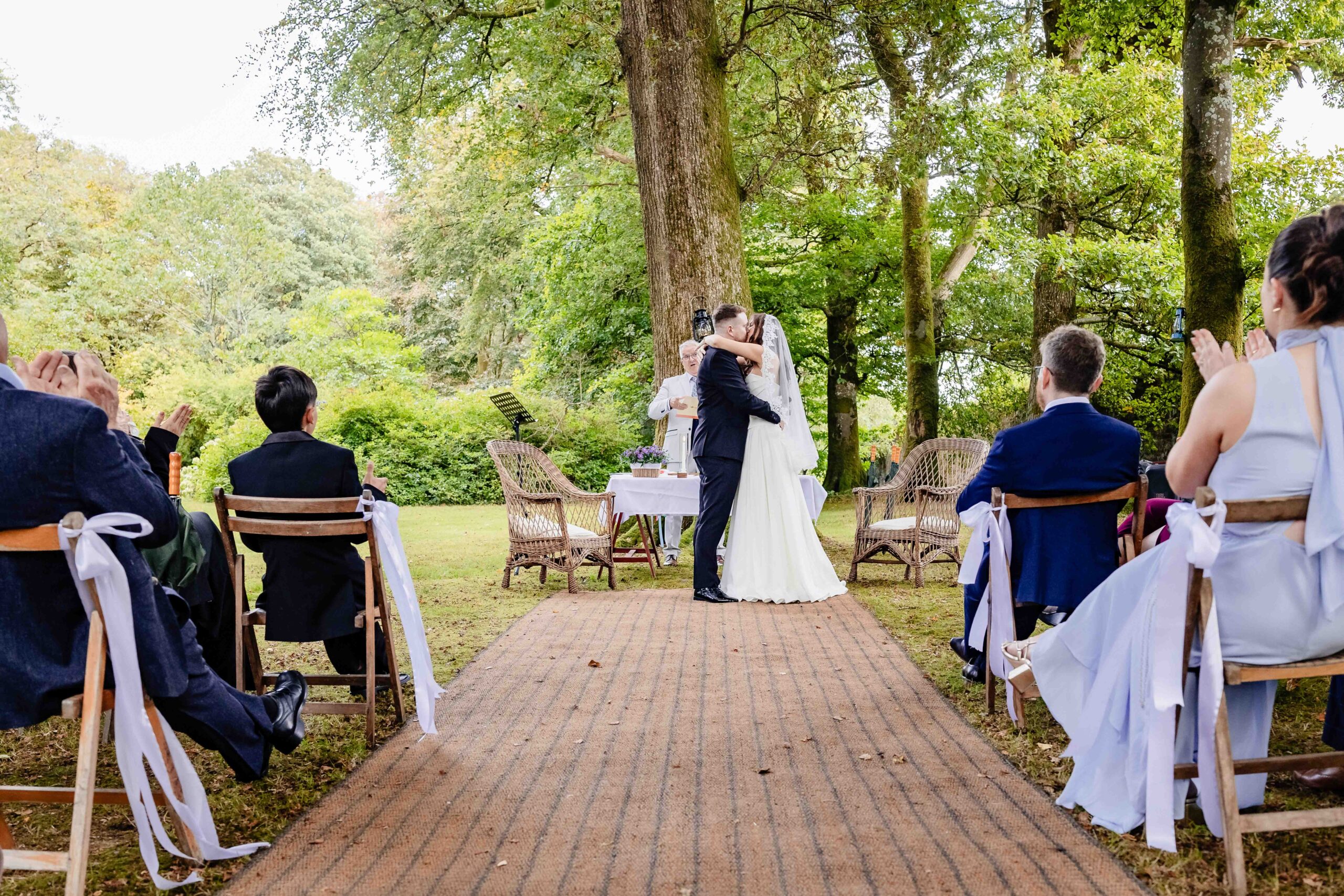 Candid congratulations following an outdoor wedding ceremony at Ballyvolane House – JOD Photography