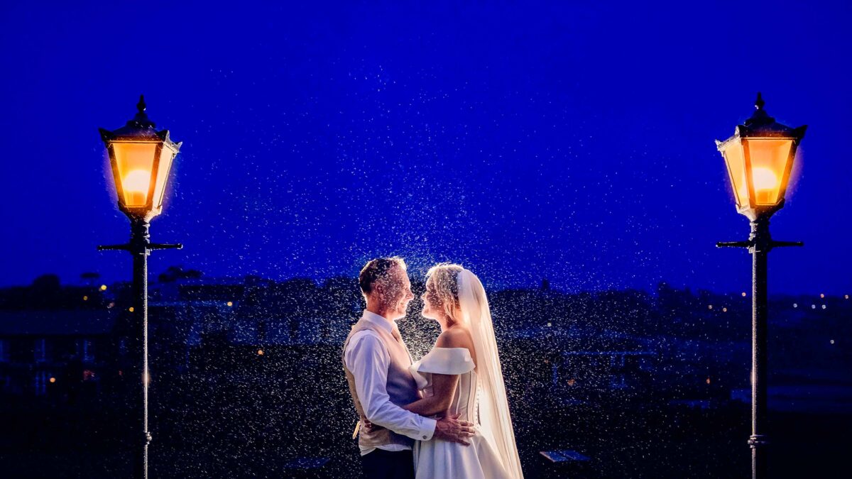 Dramatic rainy wedding portrait of Sinéad and Roly near Old Head Kinsale