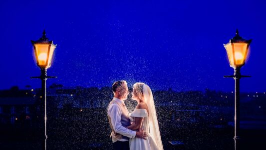 Dramatic rainy wedding portrait of Sinéad and Roly near Old Head Kinsale