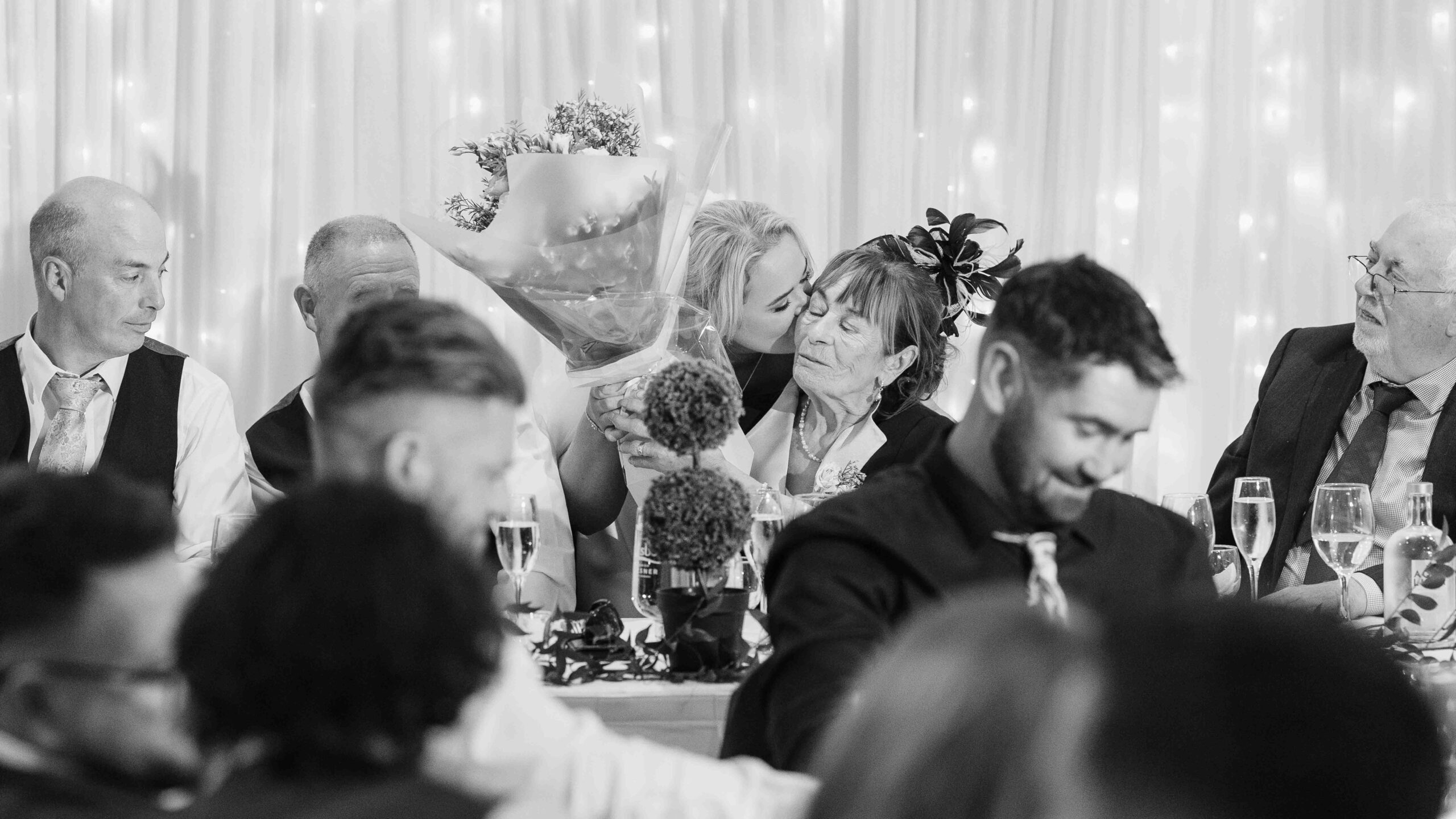 Sinéad and Roly laughing together during their wedding photographs near Old Head