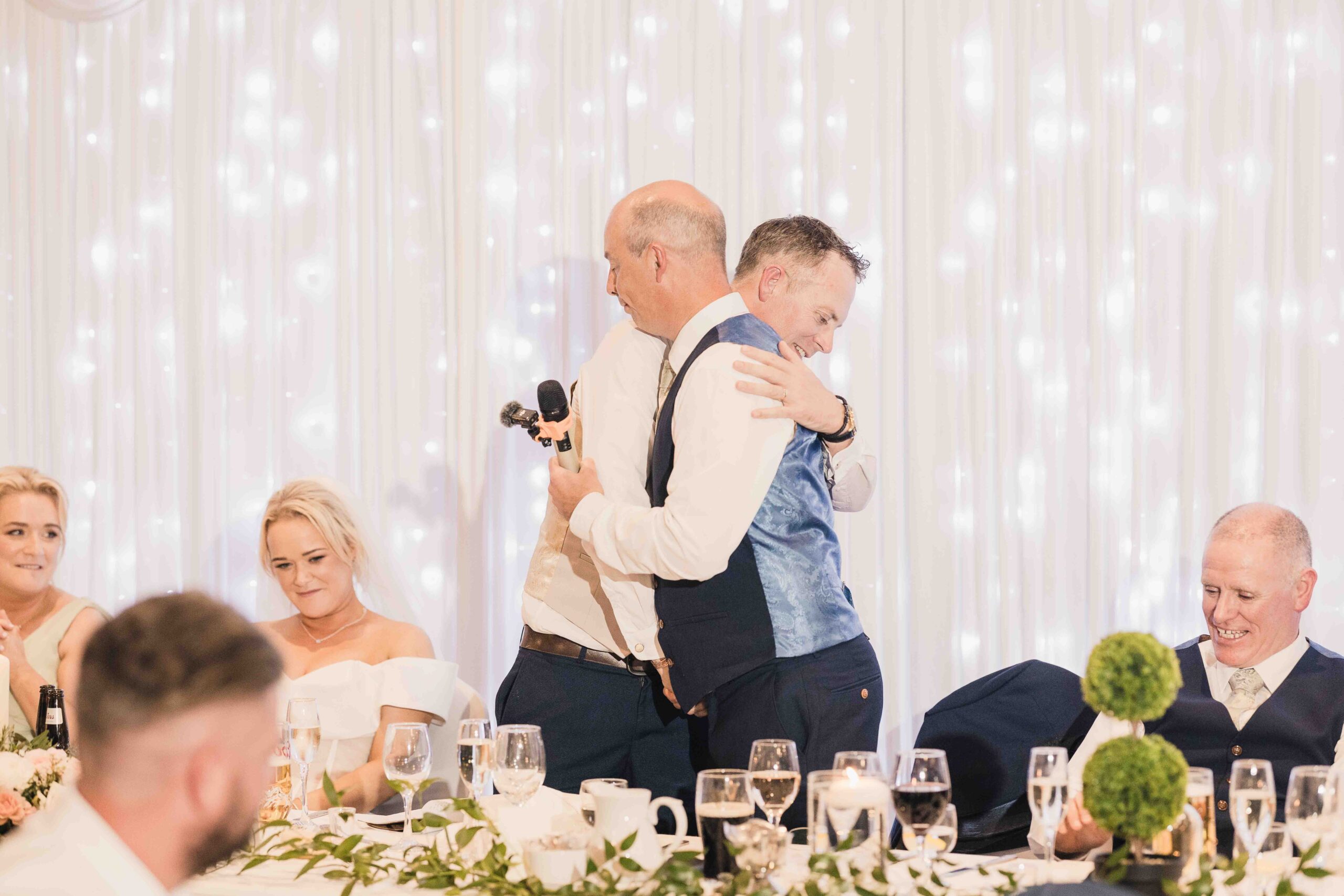 Sinéad and Roly celebrating their wedding reception at Actons Hotel in Kinsale