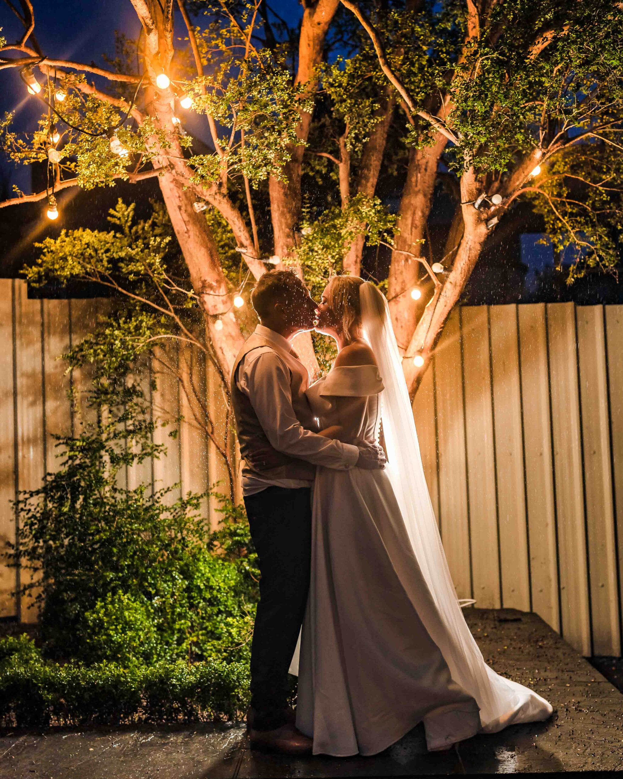 Dramatic rainy wedding portrait of Sinéad and Roly near Old Head Kinsale