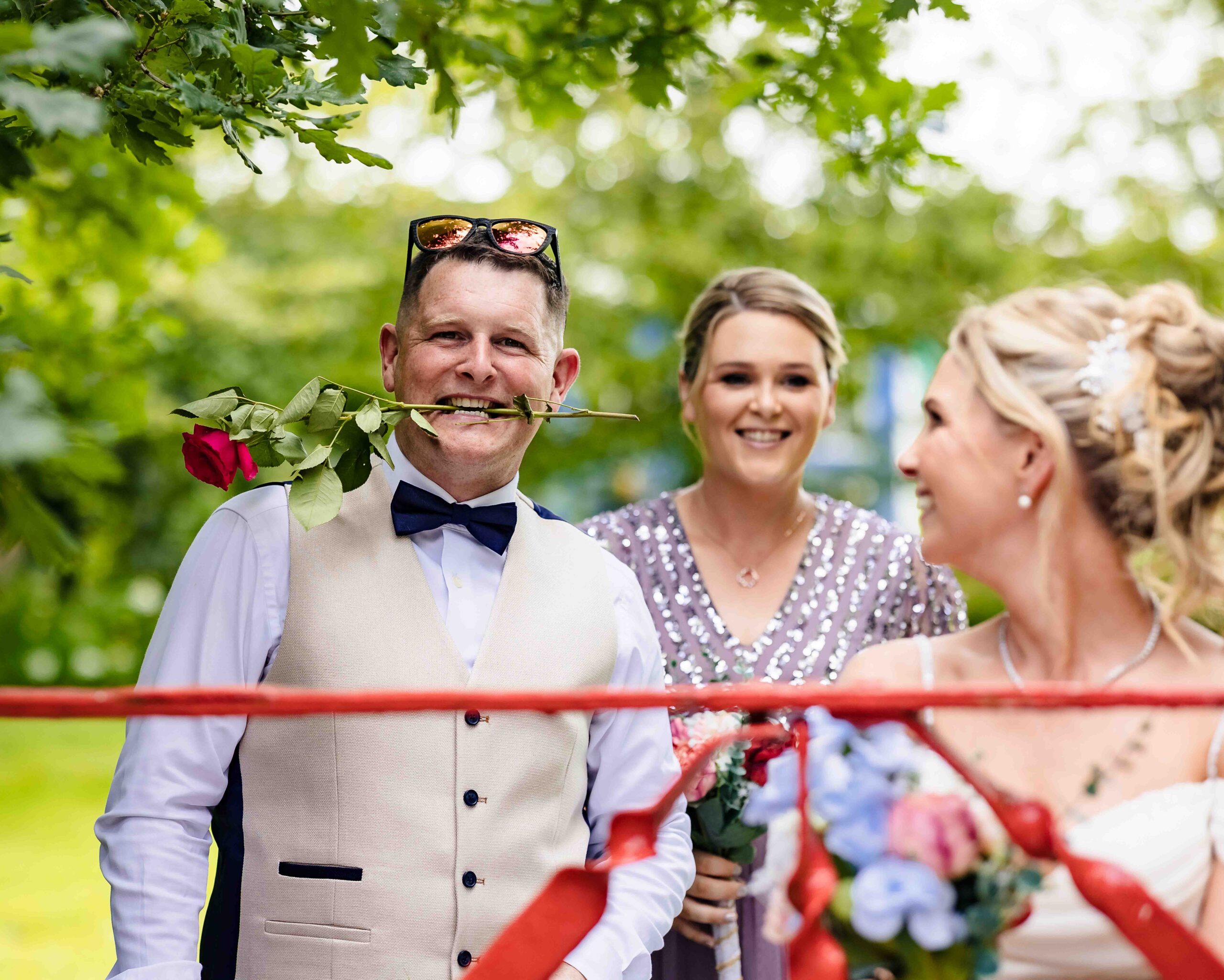 Shane and Suzy exchanging vows surrounded by family and friends