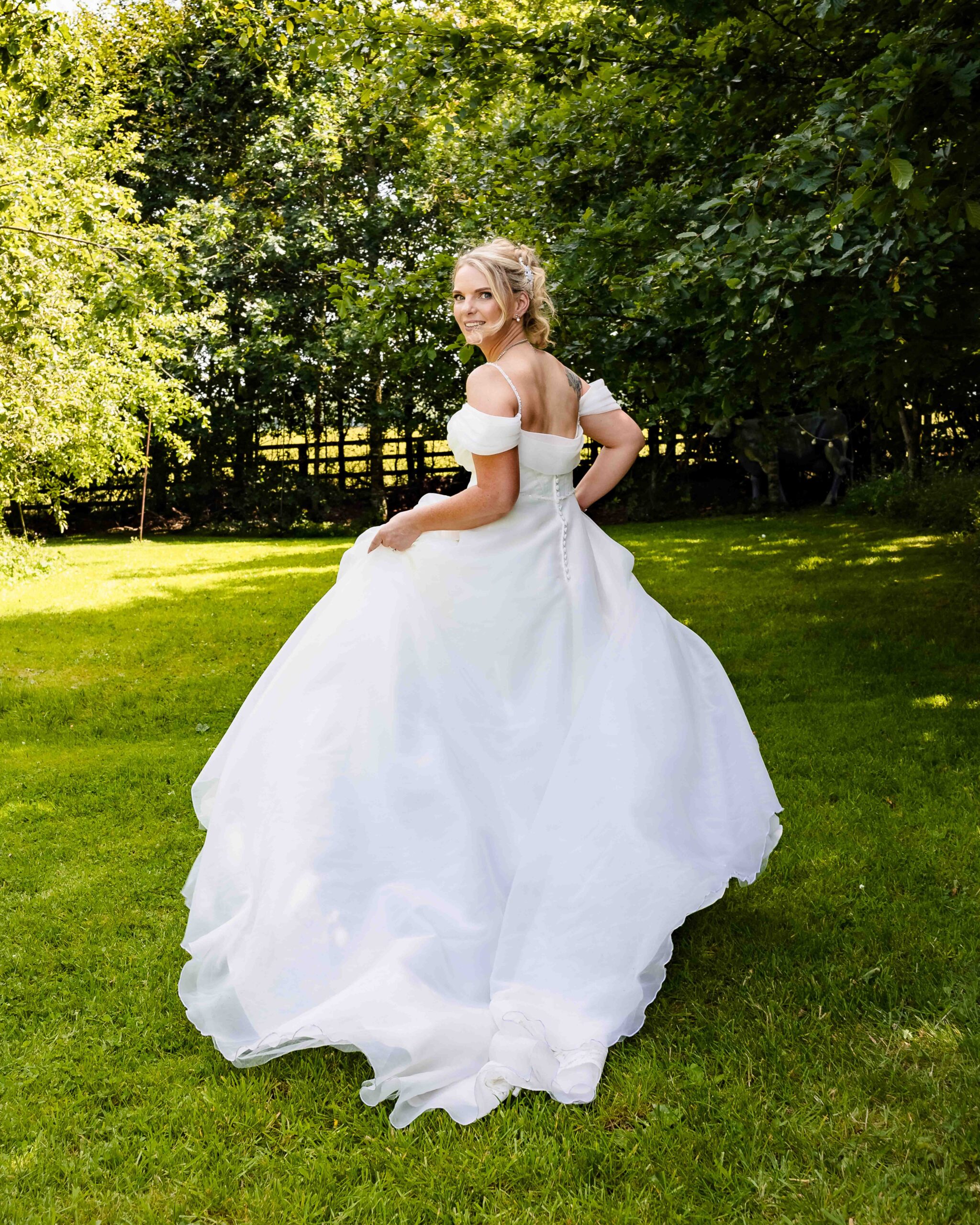 Candid guest photography during a summer wedding at The Village Barn