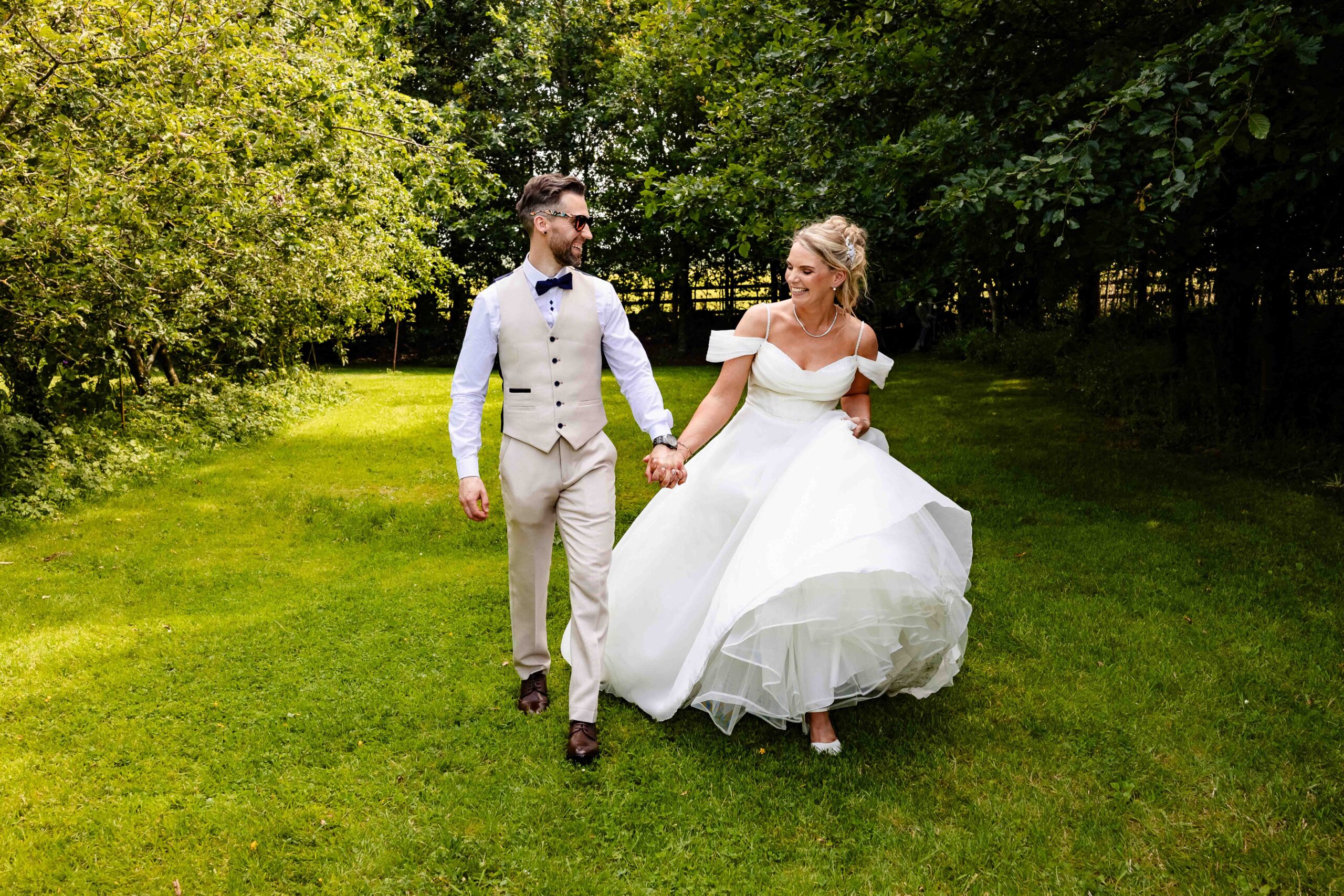 Outdoor walkway leading towards The Village Barn wedding venue