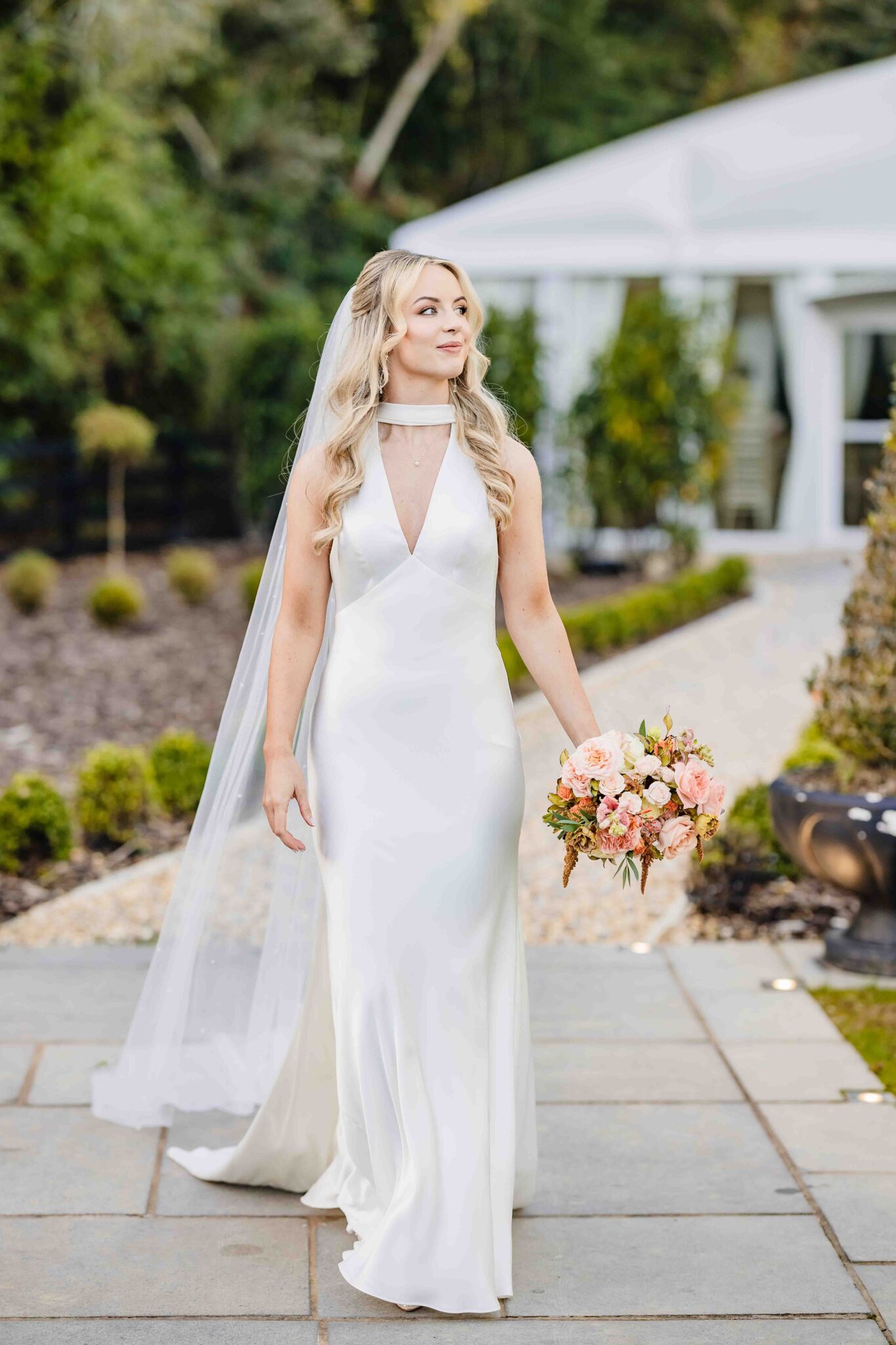 Full-length bridal portrait of Stacey on the stone path at Vienna Woods Hotel, Cork wedding photographer