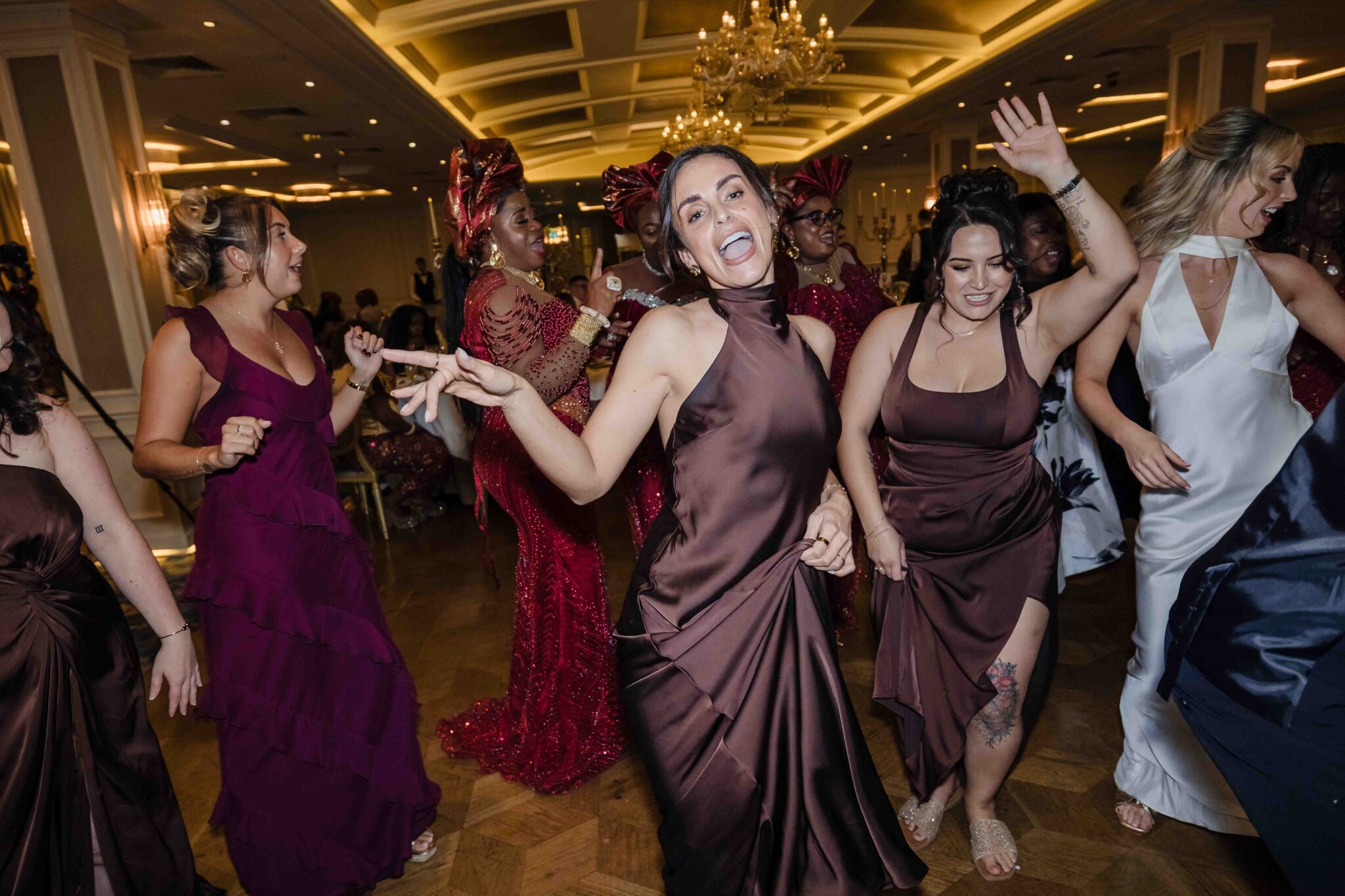 Bridesmaids and guests dancing at the Vienna Woods Hotel wedding reception, Cork wedding photographer