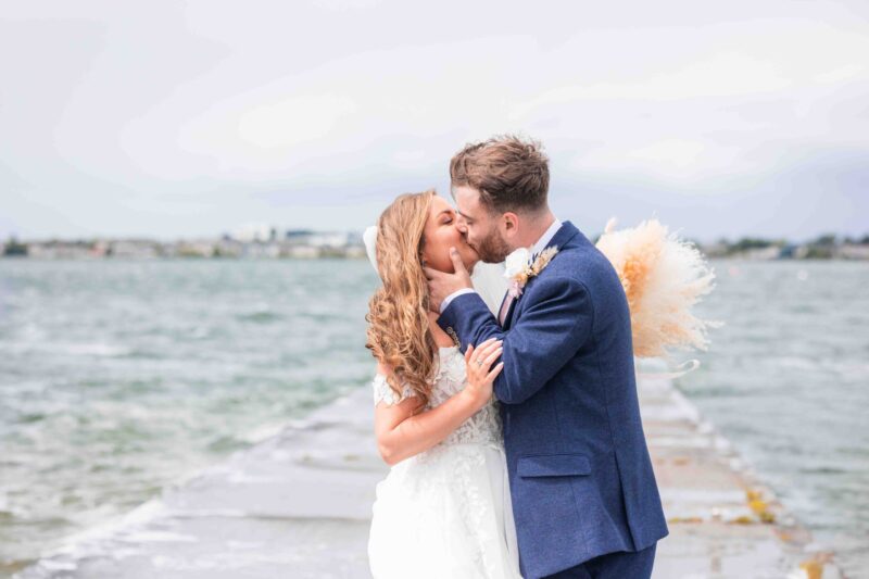 Friends hugging MJ post-ceremony – JOD’Photography