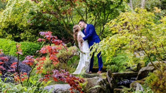 Couple portraits beside bridges and streams in Tramore
