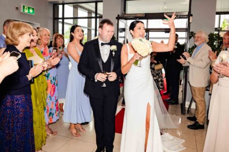 Newlyweds entering Kenmare Bay Hotel reception – JOD Photography
