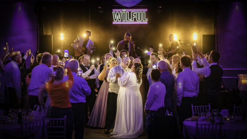 Bride and groom sharing their first dance surrounded by family and friends at an Irish wedding captured by JOD Photography